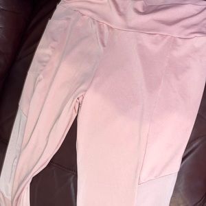 Pink leggings.